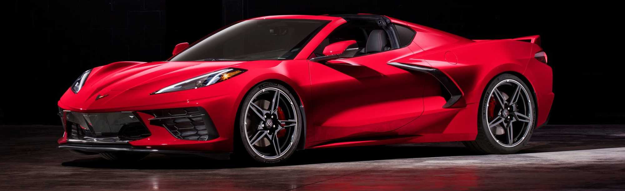 Red c8 Corvette in showroom