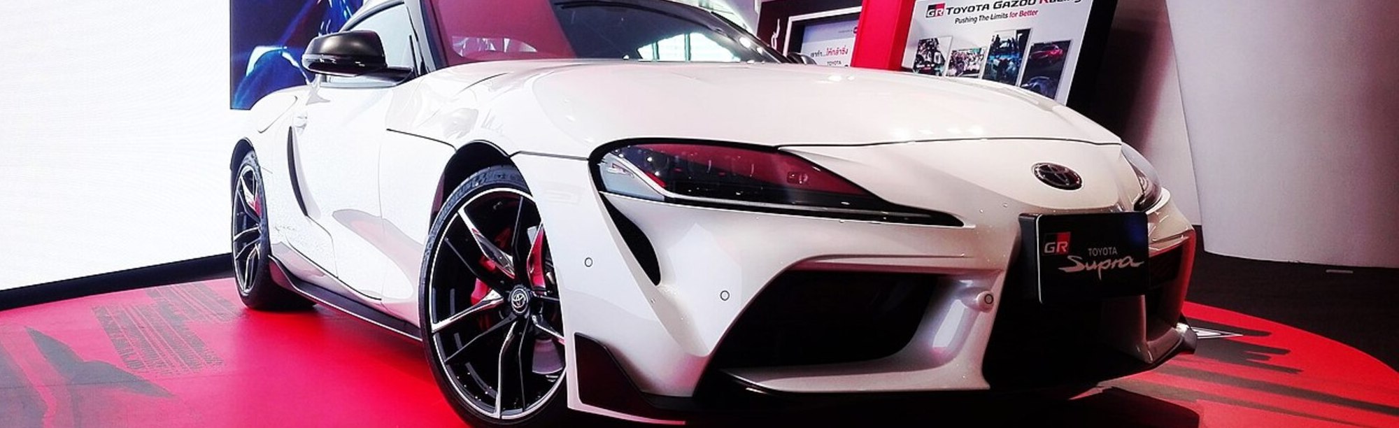 White 2020 Toyota Supra in a showroom