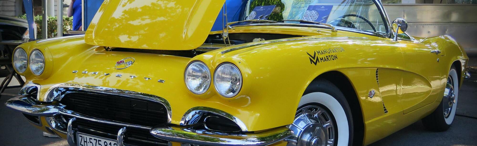 Yellow C1 corvette with hood up