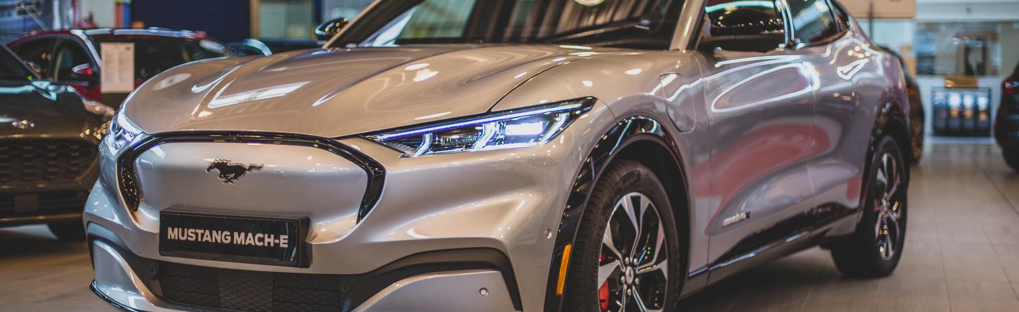 2021 Silver Mustang Mach-E SUV in showroom