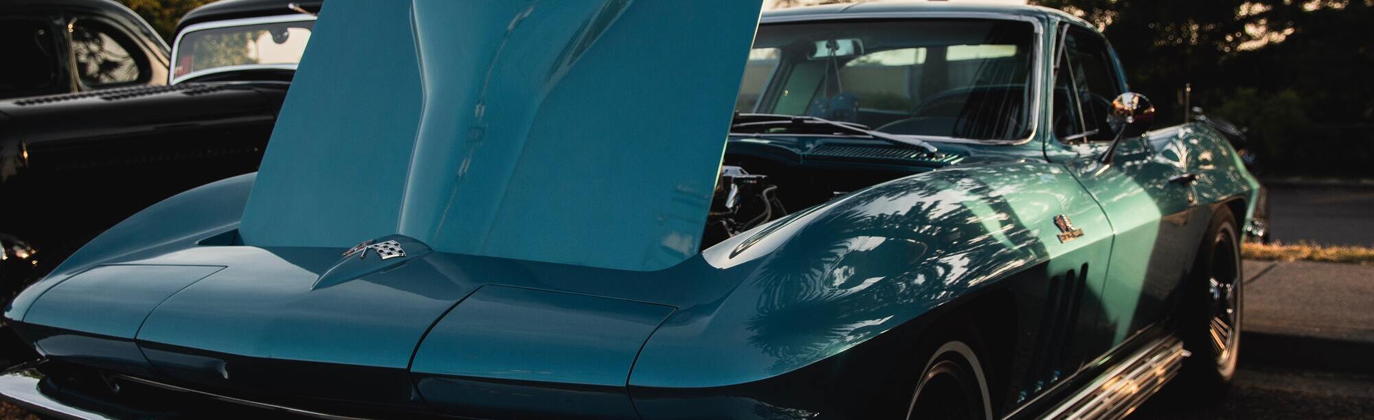 Blue C2 corvette with hood open