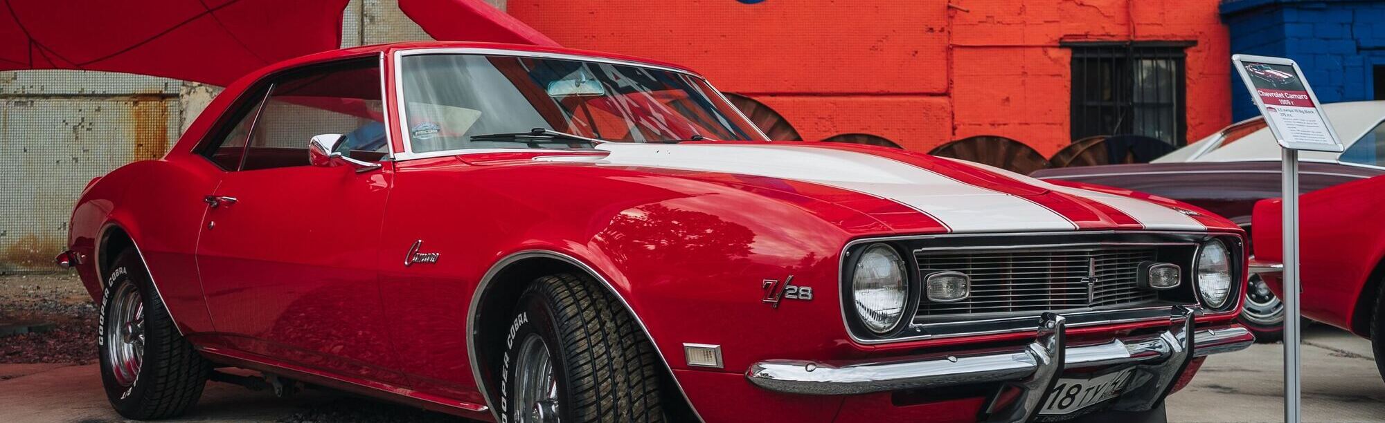 Red 1969 Camaro Z28 with white stripes